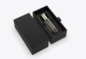 Elegant high quality black customized cosmetic box with glass bottle kept in it.